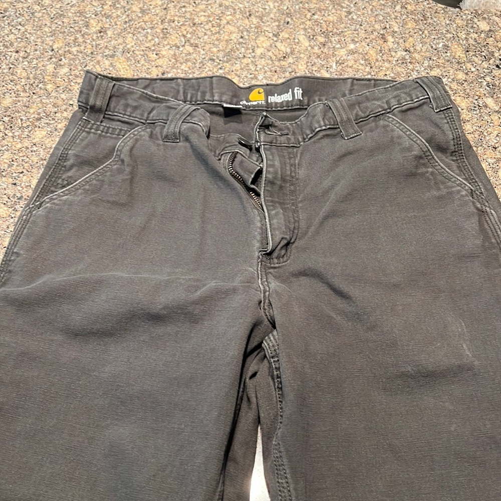 Carhartt work pants 33x34. Minor wear, great condition